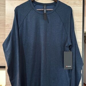 Brand new with tags! Long sleeve Lululemon dark blue XL